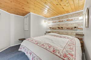 Wood plank ceiling and a feature wall with horizontal wood planks