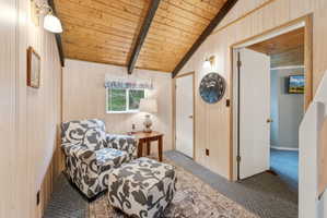 Vaulted wood-plank ceiling with exposed beams