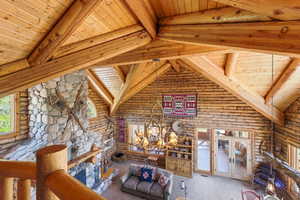 Vaulted ceiling with exposed wood beams and planking