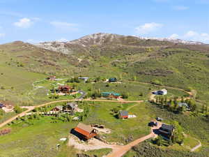 Mountainous terrain with scattered residential properties