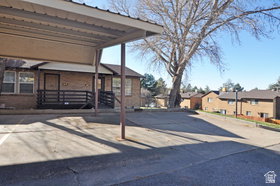 Carport parking with a paved surface