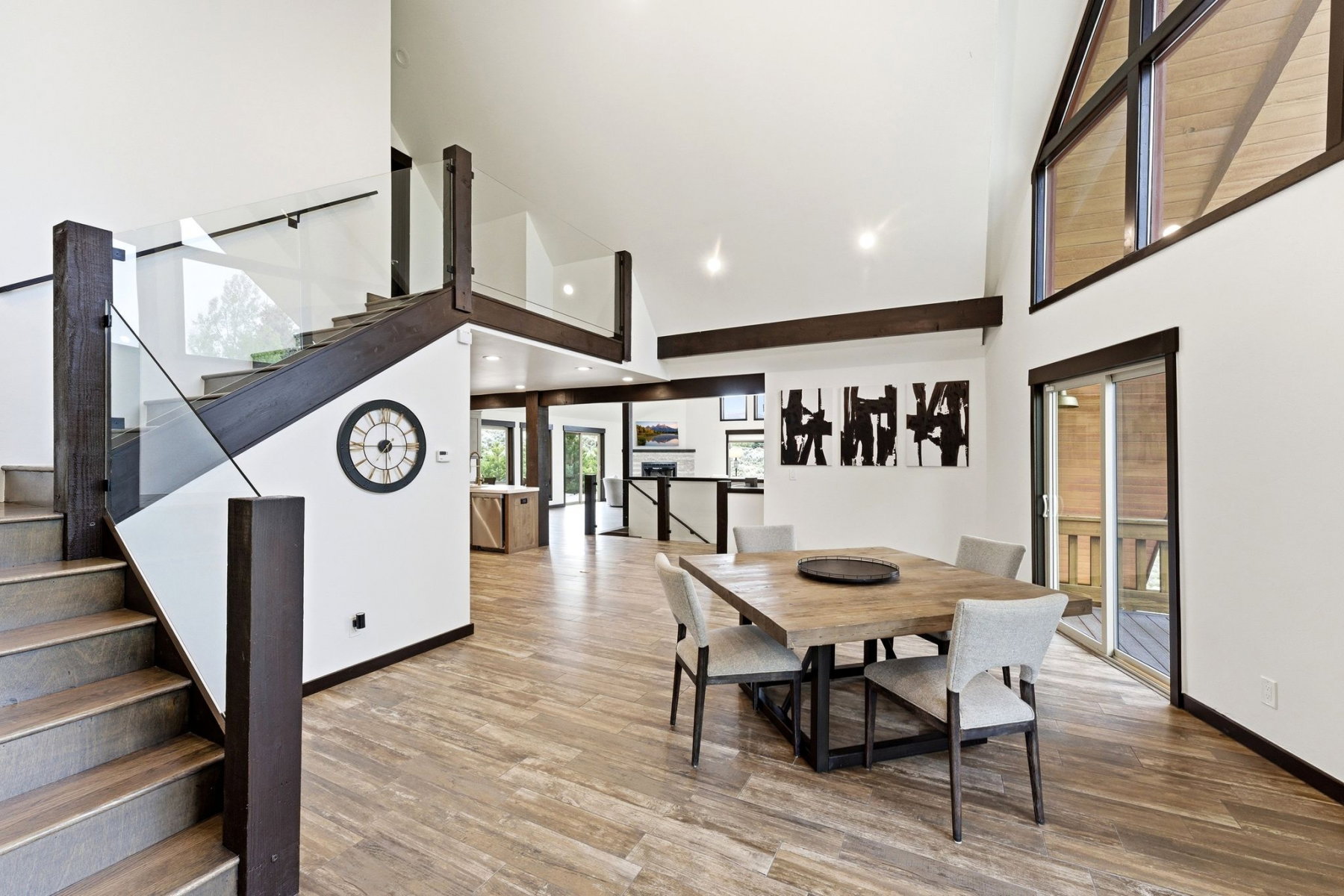 High vaulted ceilings framing large picture windows