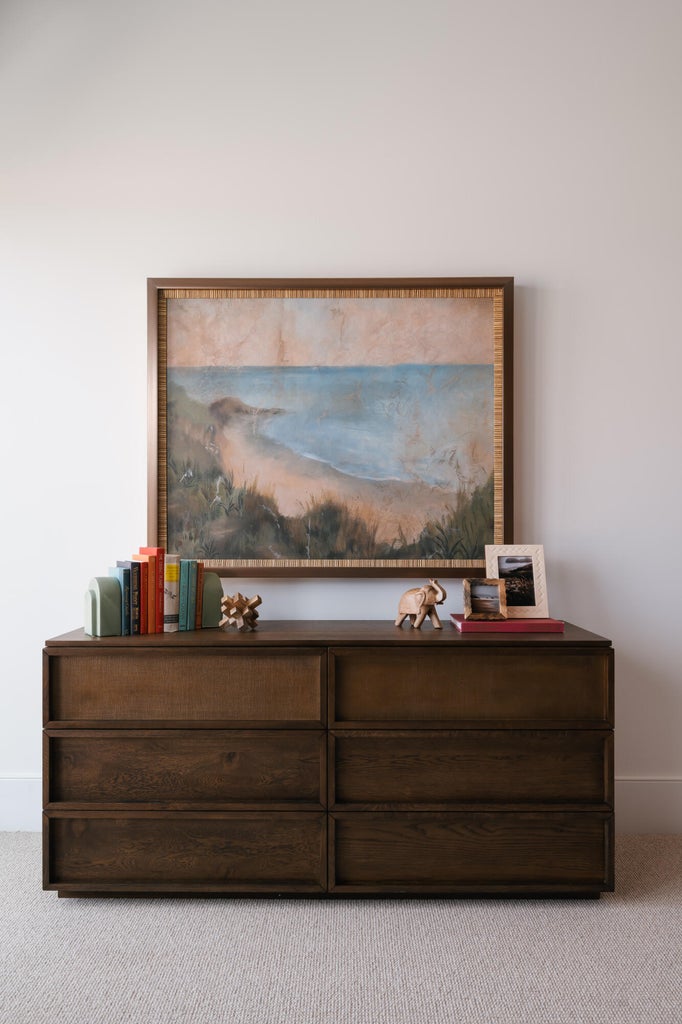 Plush neutral carpeting extends throughout this space