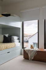Built-in bunk beds featuring shiplap detailing and integrated storage drawers