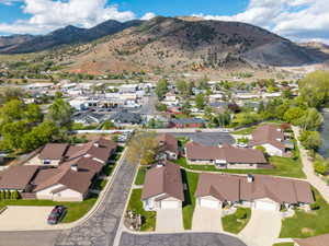 Aerial perspective showcasing residential properties with brown shingle roofs