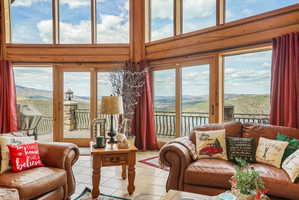 Expansive window walls showcasing mountain scenery