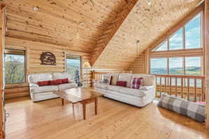 Vaulted wood-paneled ceilings with exposed beams