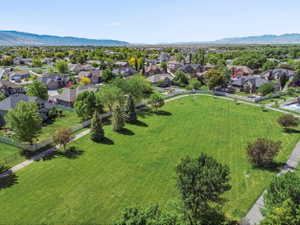 Step Into this Huge Grass Area with a Walking or Bike Path