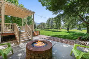 Deck, Pergola, & Patio with Firepit Area & Water Feature