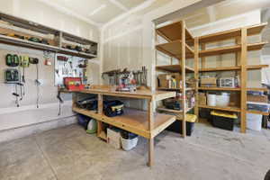 Extra Deep Garage with Built in Workbench & Shelving