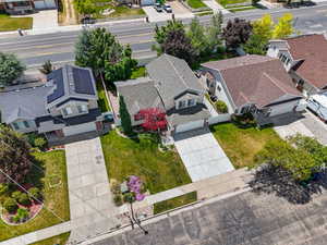 Aerial perspective highlighting a residential street with multiple properties