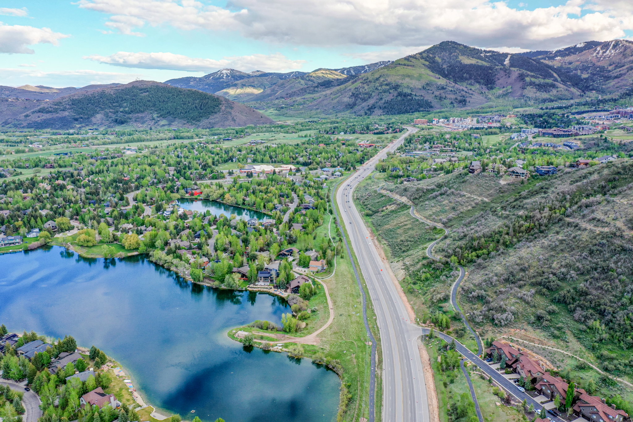 Aerial perspective showcasing a residential area with varied topography