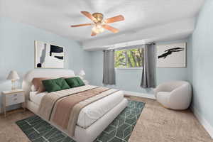 Primary Bedroom featuring light blue walls, a ceiling fan, and carpet flooring