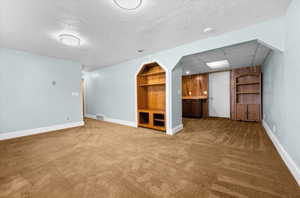 Spacious family room with with walkout to back yard, wet bar, and bonus room to be for exercise, office, etc.