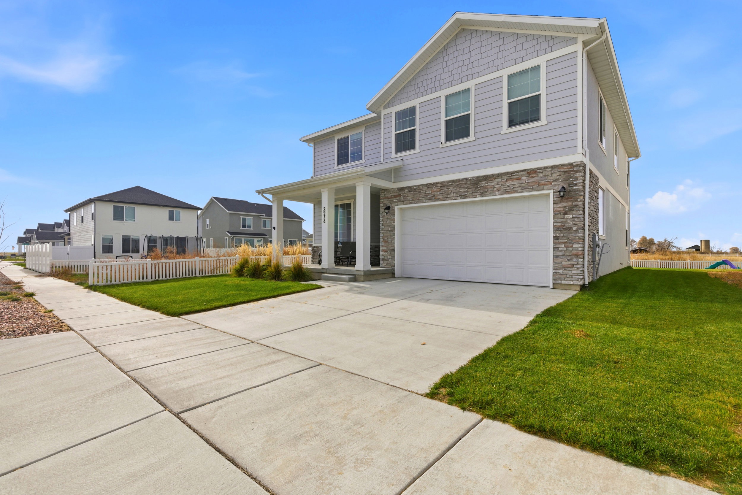 Two car garage with driveway parking too