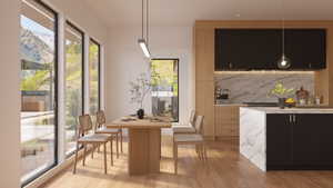 Open-concept living space featuring expansive floor-to-ceiling windows, light wood-finish flooring, a contemporary dining table with chairs, a modern linear pendant light fixture, and a kitchen with two-tone cabinetry and a waterfall island