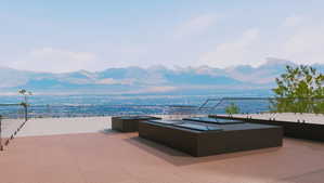 Expansive outdoor patio featuring large-format tile flooring, frameless glass railings, and built-in planters with integrated skylights