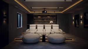 Dedicated media room with tiered seating and integrated ceiling lighting