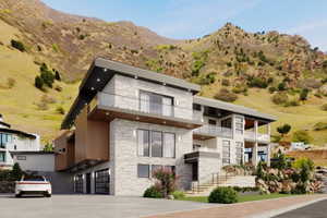 Modern architectural design featuring stacked stone accents and wood-tone cladding