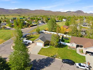 Single-story residence with a two-car garage and a paved driveway