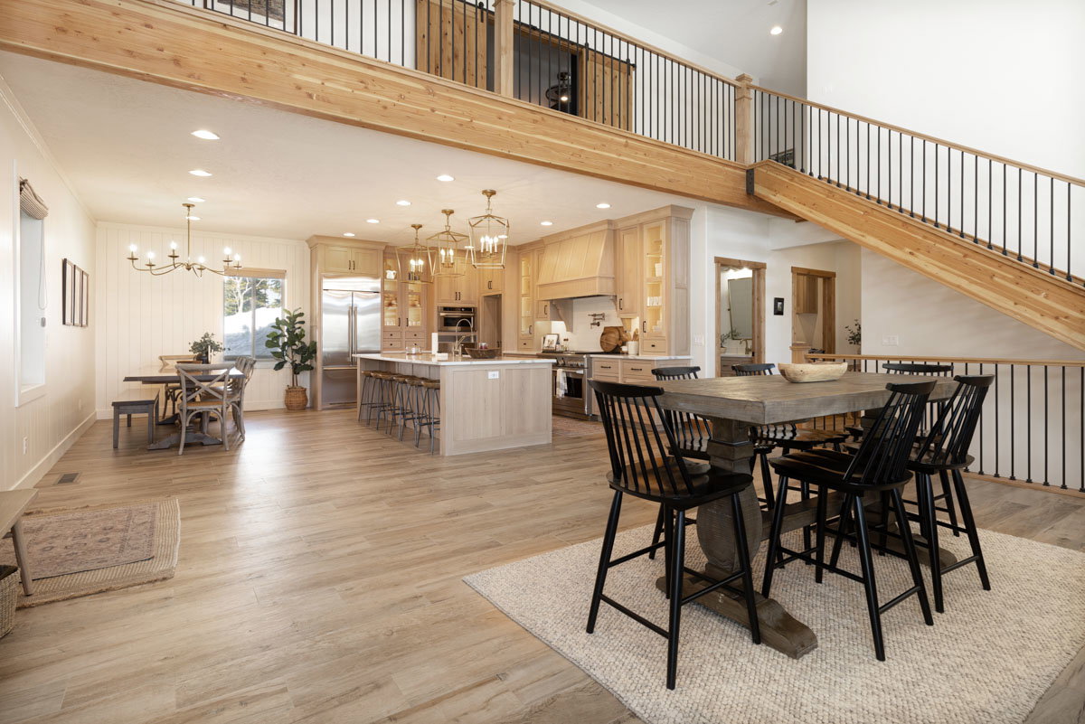 Open-concept living area with wood-finish flooring throughout