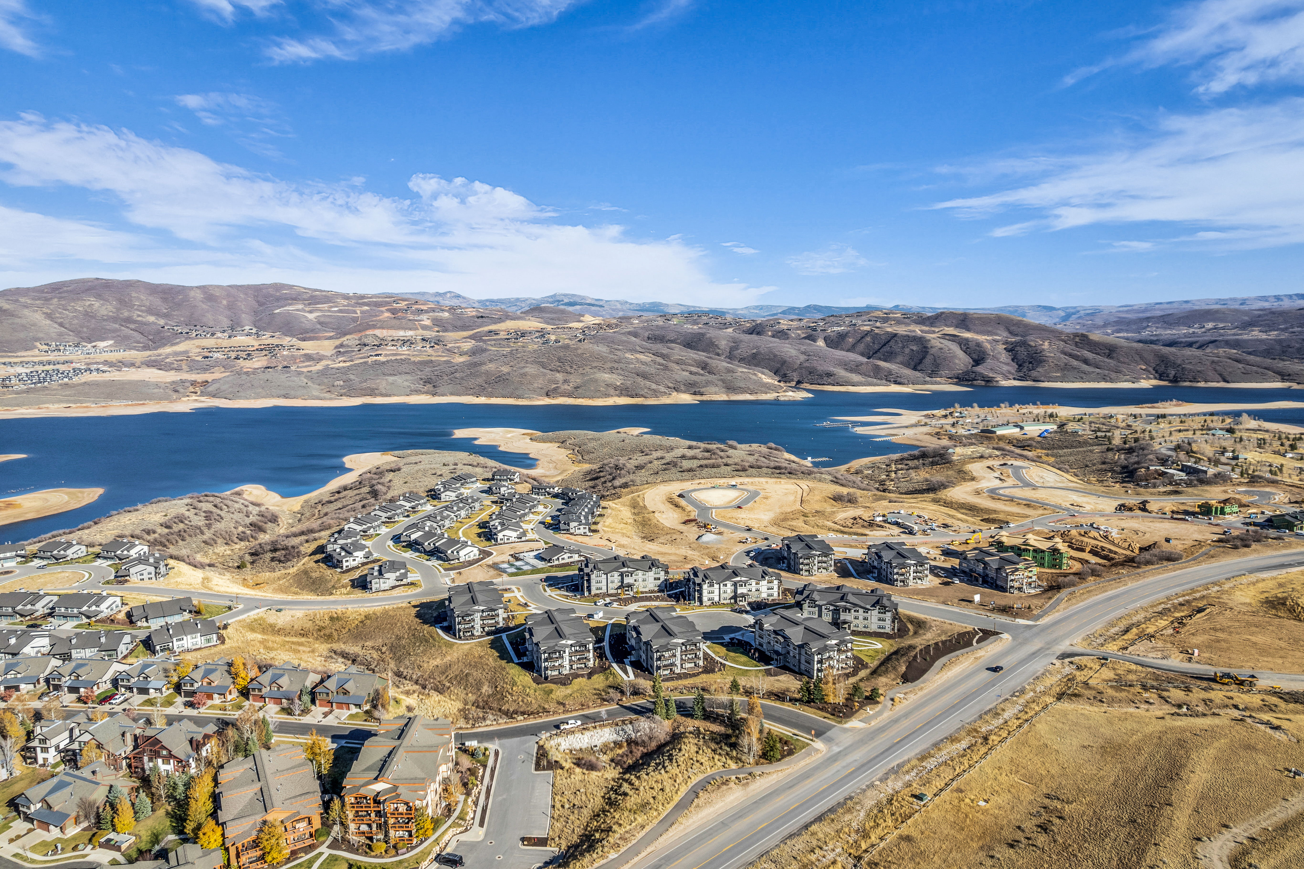 Aerial perspective showcasing extensive waterfront presence and a developed residential community