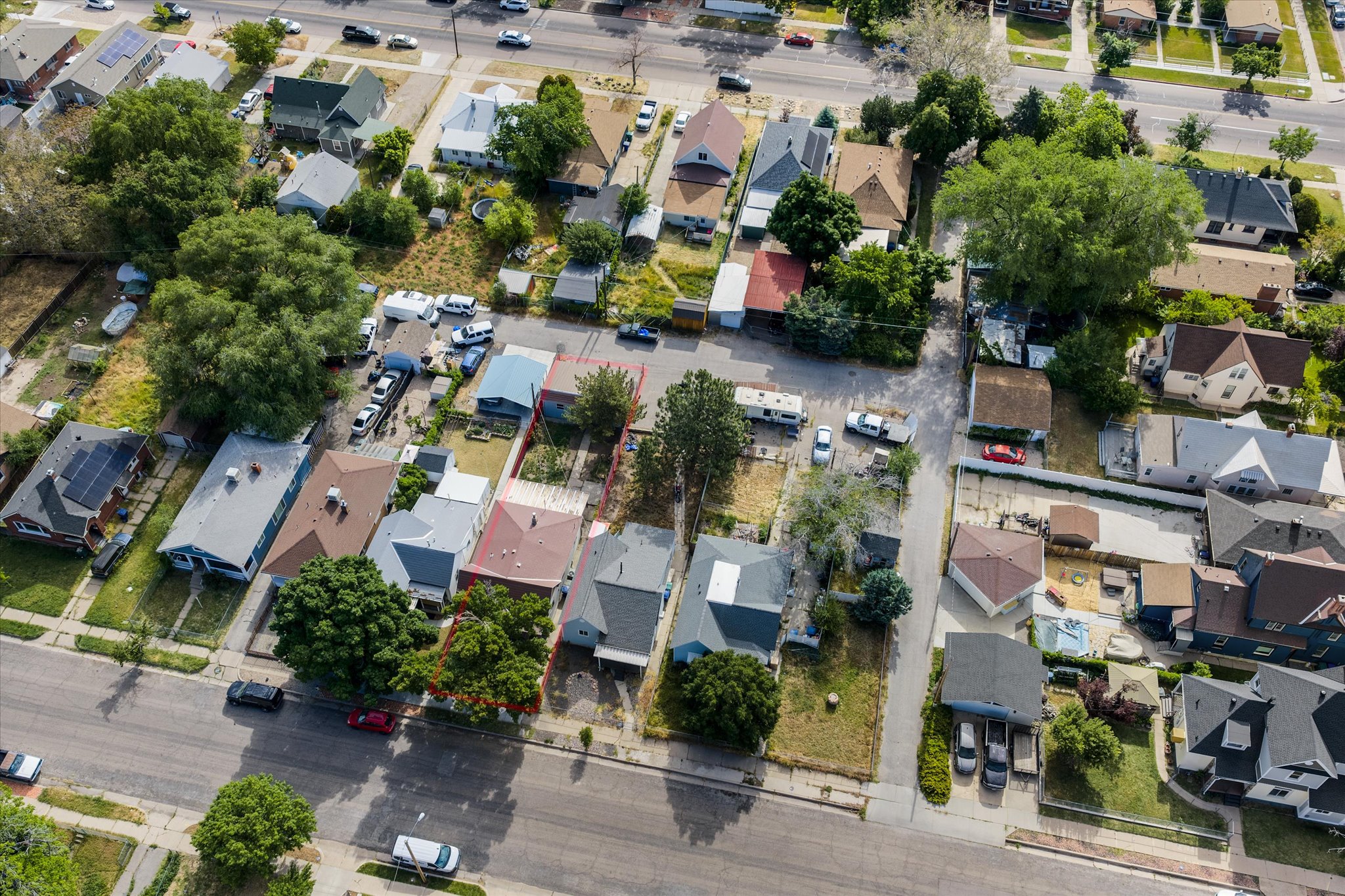 Aerial perspective showcasing a residential neighborhood with a street grid pattern
