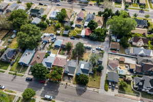 Aerial perspective showcasing a residential neighborhood with a street grid pattern