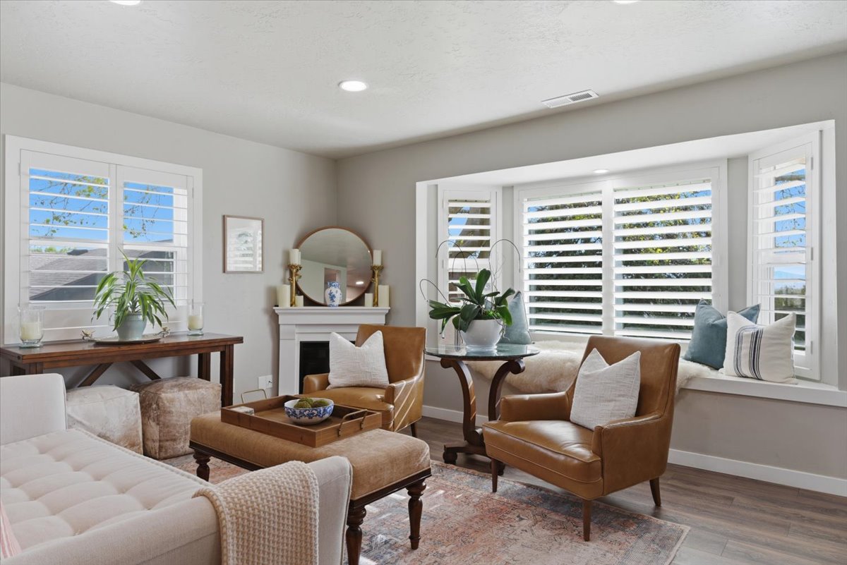 Living area featuring wood-finish flooring and a neutral color palette