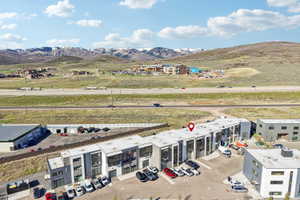 Modern industrial-style buildings with multiple garage bays