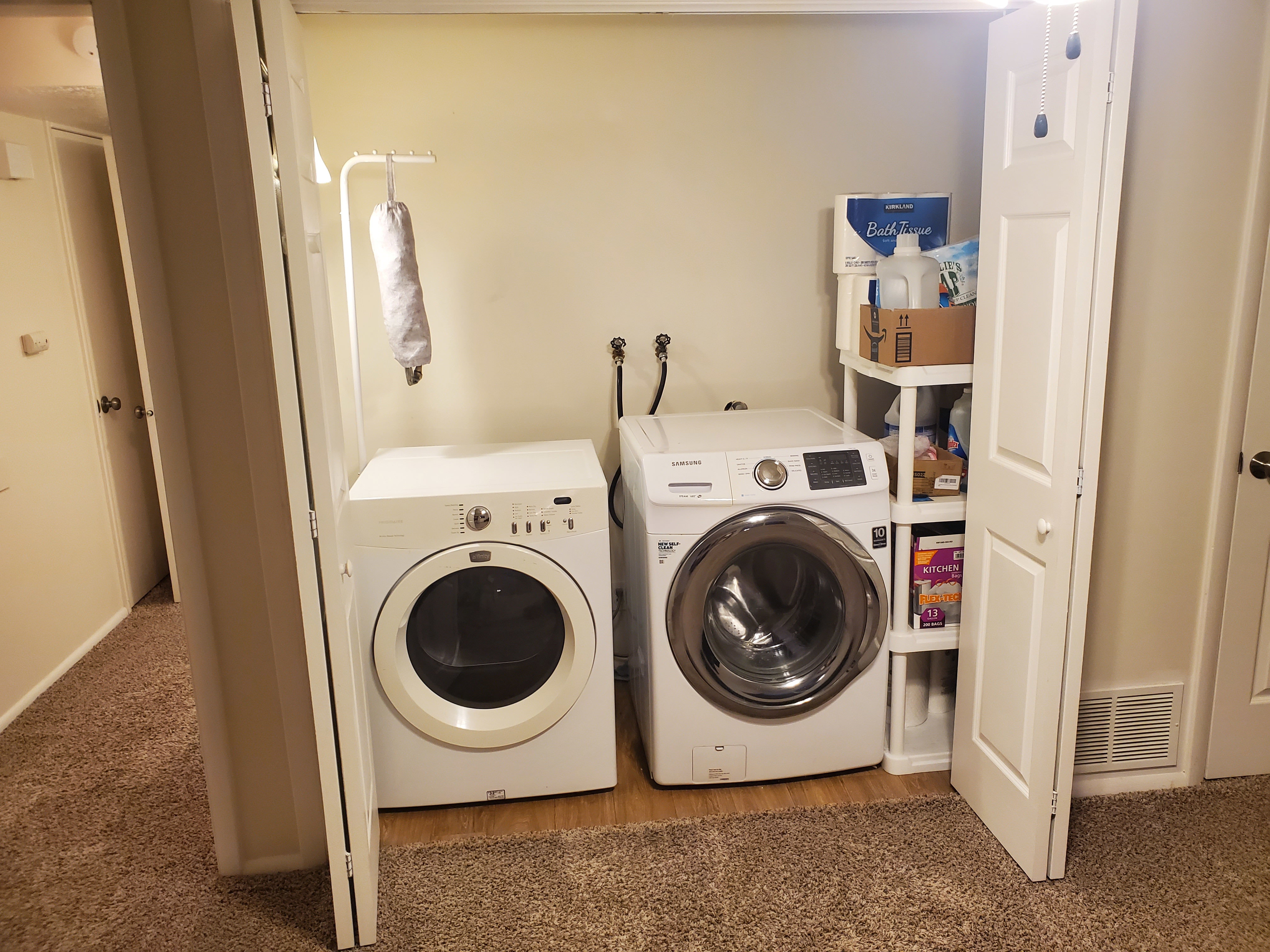 Dedicated laundry area with folding bi-fold doors