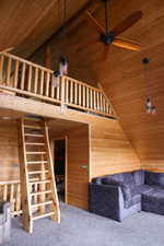 Vaulted wood-paneled ceilings with exposed beams