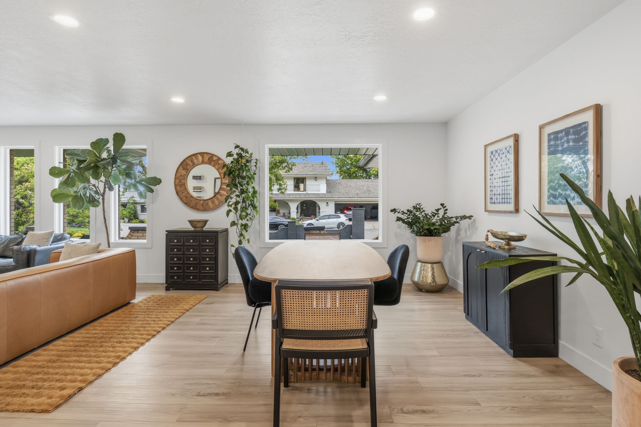 Open-concept living area featuring light wood-finish flooring throughout