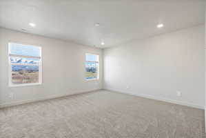 **Disclaimer**  Interior package may vary. Expansive interior space featuring light gray carpeting and white walls