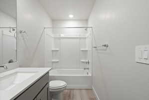 **Disclaimer**  Interior package may vary. Bathroom featuring a full vanity with an integrated sink, polished chrome faucet, and undermount cabinetry