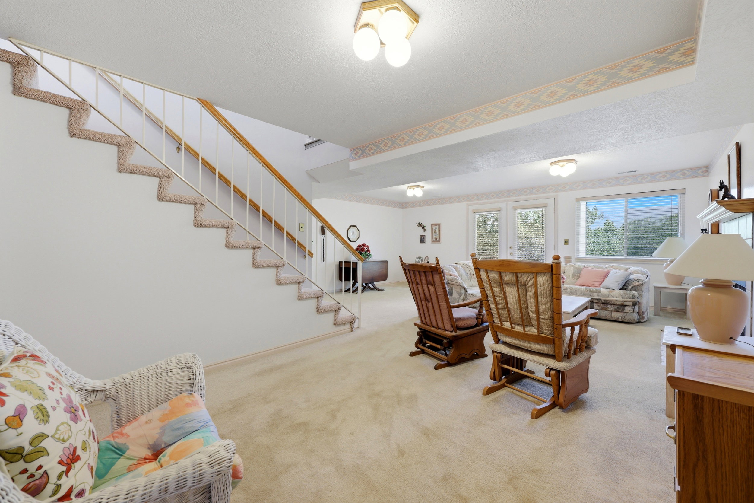 Lower level featuring carpeted flooring and white walls