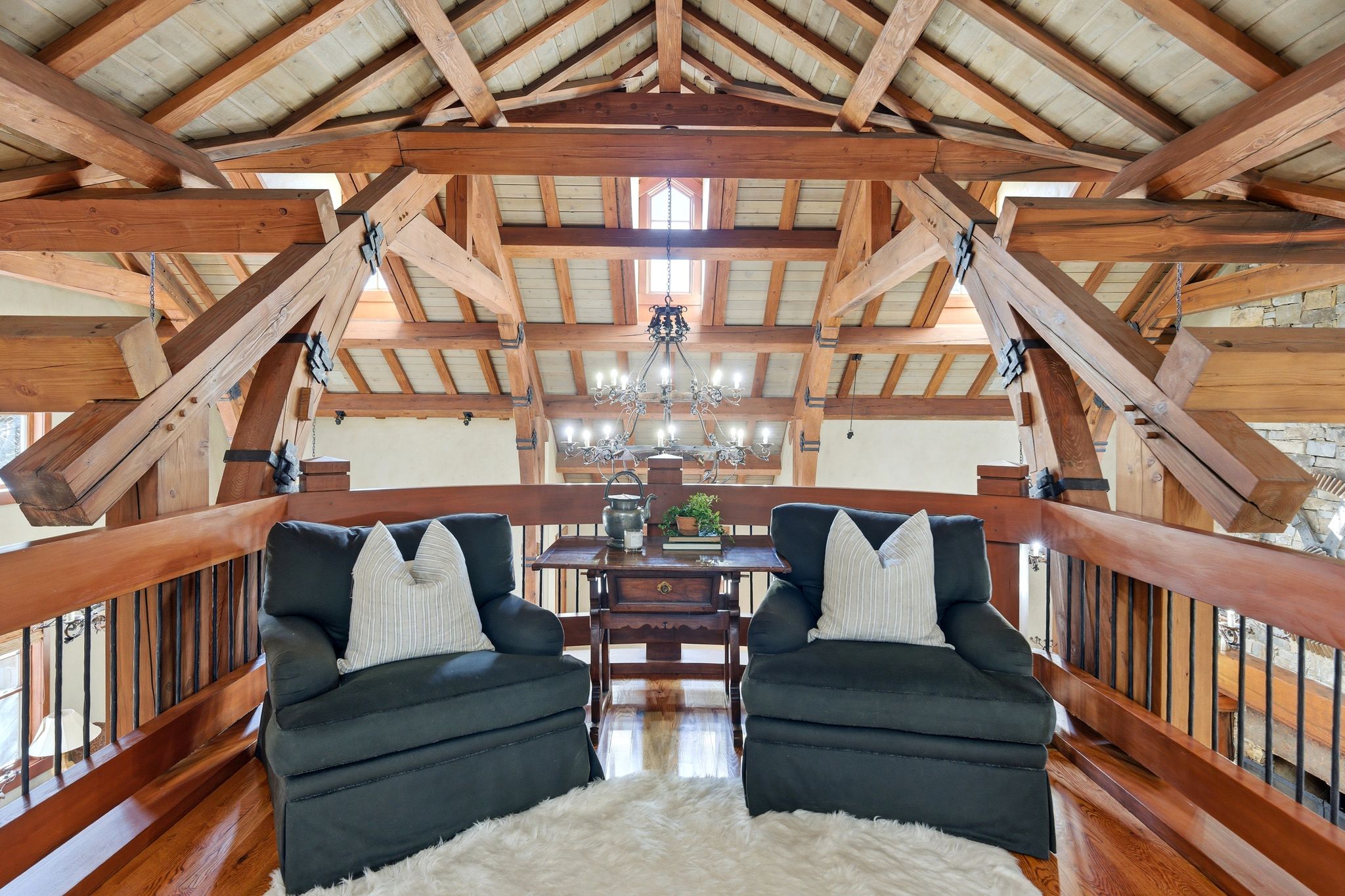 Exposed timber frame construction featuring vaulted ceilings and a skylight