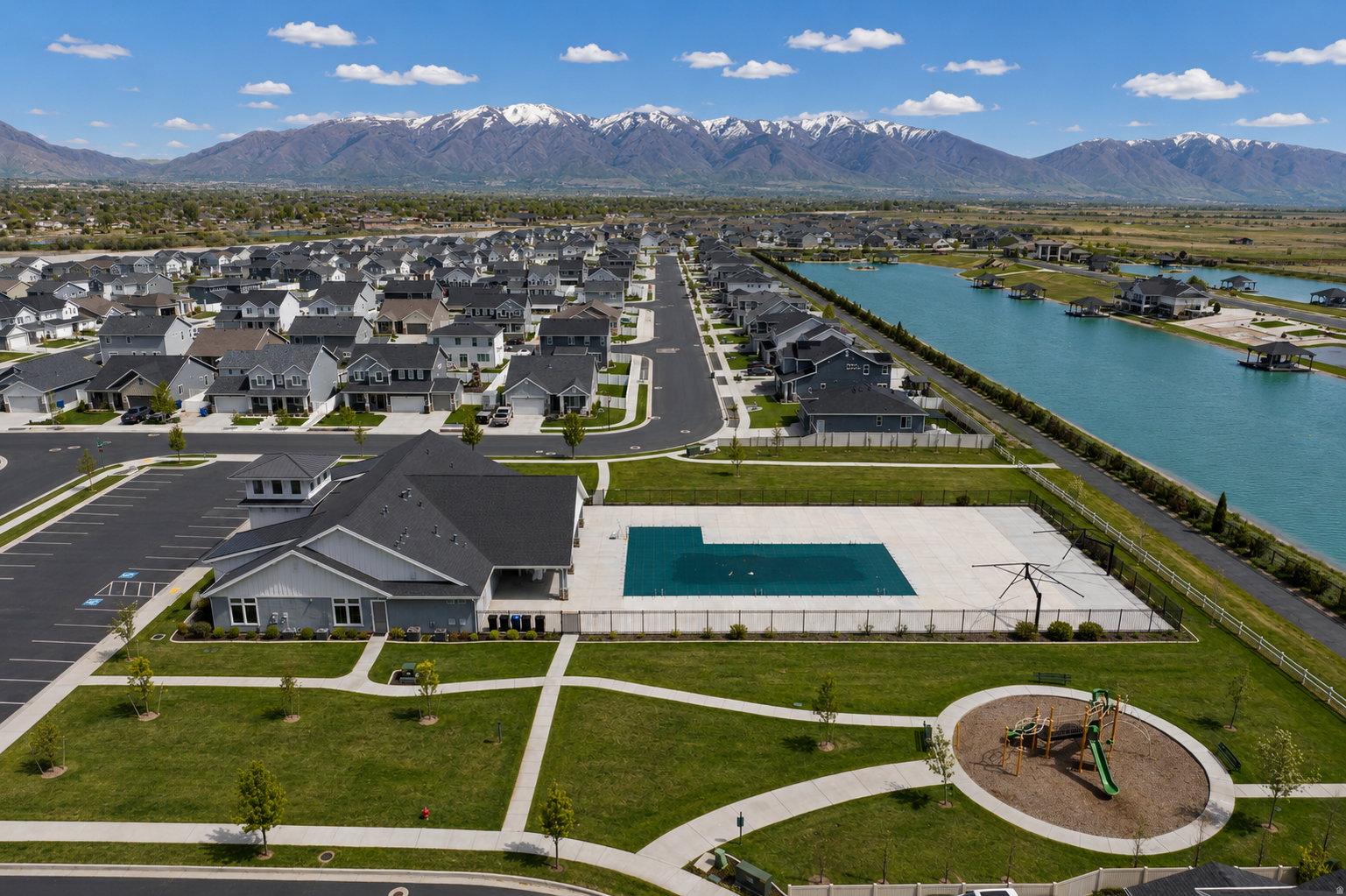 Community amenities featuring a clubhouse, outdoor swimming pool, and playground