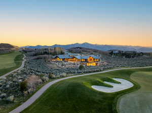 Expansive golf course property featuring a modern architectural residence