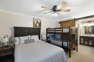 Neutral-toned bedroom featuring shiplap accent walls, a dark wood headboard, and bunk beds