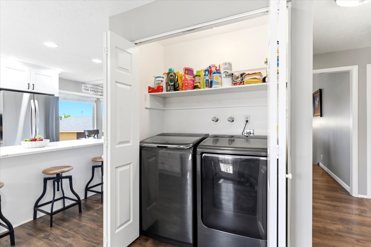 Dedicated laundry closet with shelving