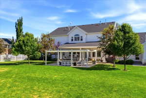Expansive green lawn with mature trees