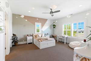 Spacious room featuring broadloom carpeting and a ceiling fan