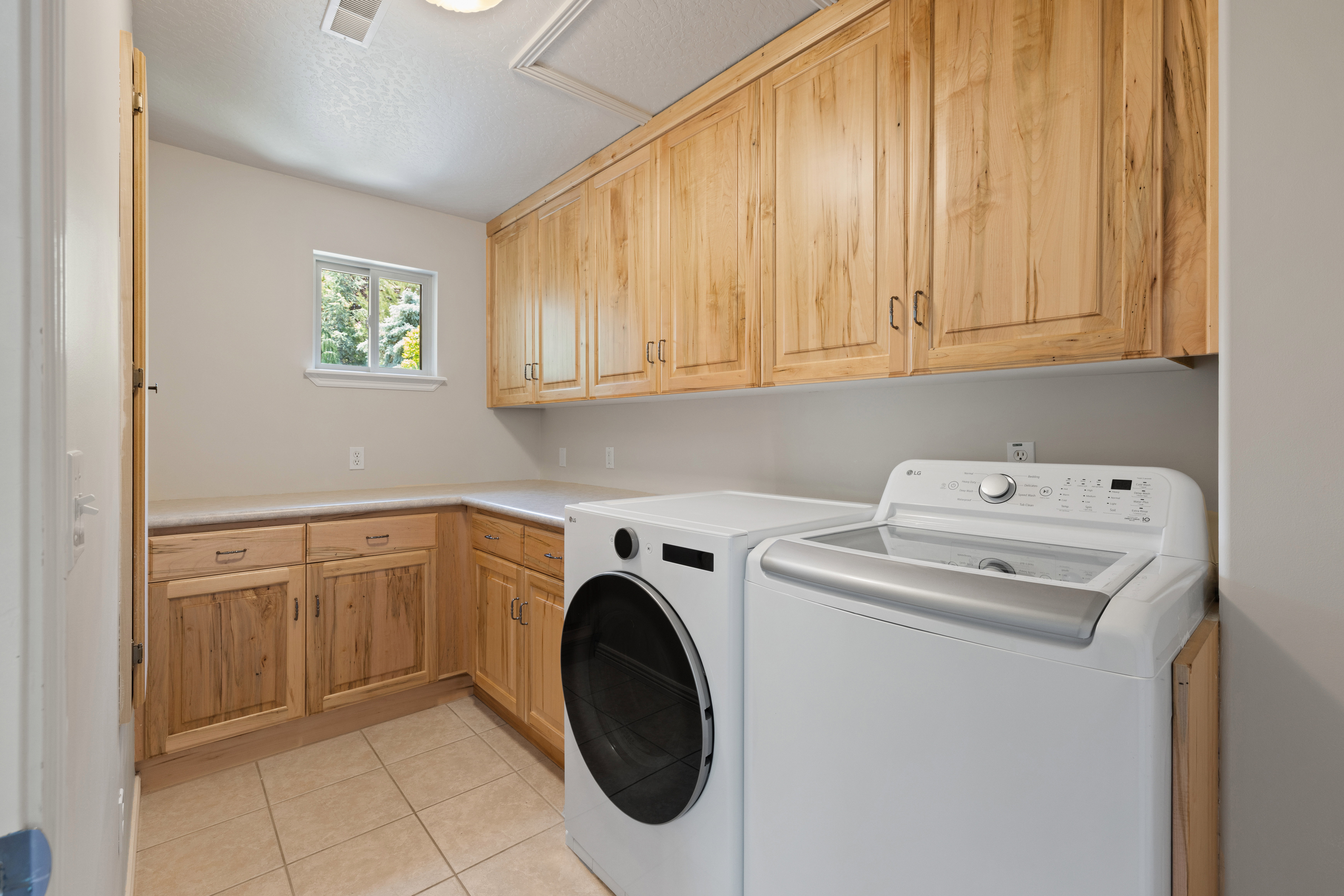 Laundry room adjacent to bedrooms