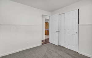 Room featuring neutral wall paint and white beadboard wainscoting