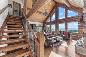 Soaring vaulted ceilings with exposed wood beams