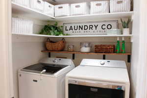 2nd floor laundry perfectly located near bedrooms. Features built in shelving!