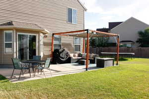 Spacious, secluded backyard with concrete patio and convenient access to the kitchen/dining. Fully fenced!