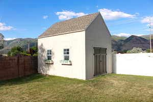 Large new shed with double doors for easy access!  Window boxes add to the charm!