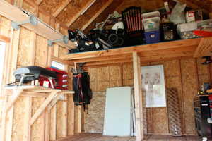 Very large storage shed with ample options for use. Storage mezzanine.